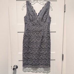 Beautiful dress that fits true to size. Muted blue/gray with flecks of silver.